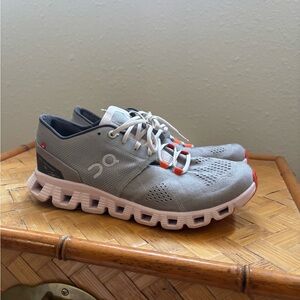 On Running Women’s Light Gray and Orange Athletic Shoes